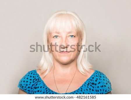 Portrait of an adult woman with white hair