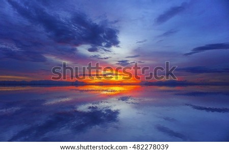 sunrise over lake and water reflection,select focus with shallow depth of field:ideal use for background
