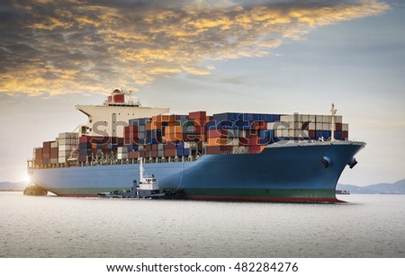 Cargo ship at the Trade Port Royalty-Free Stock Photo #482284276