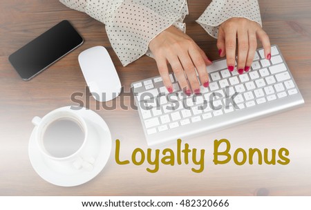 Loyalty Bonus. Business woman working with computer