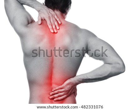 Man with pain in his back over white background Royalty-Free Stock Photo #482331076