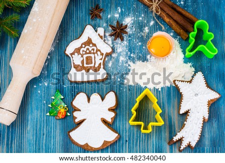 Abstract Christmas and New Year Background with Old Vintage Wooden Boards, Fir Branches, Gingerbread Studio Photo