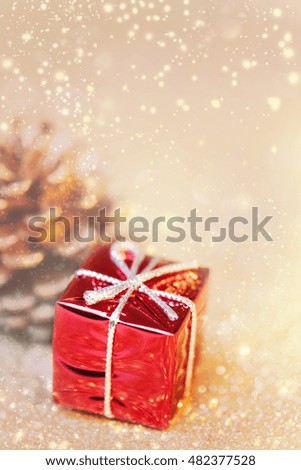 Red and golden 	xmas decoration with copy space. Christmas decoration on abstract bokeh background. Merry christmas and Happy New Year Card. 
