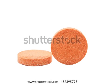 Vitamin mineral supplement effervescent tablet isolated on white background.