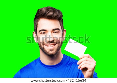 young man holding visit card