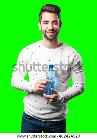 young man holding water bottle
