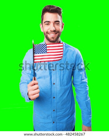 man holding a united states flag