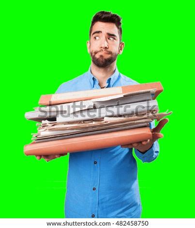 young man holding files