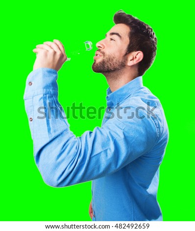 young man drinking water