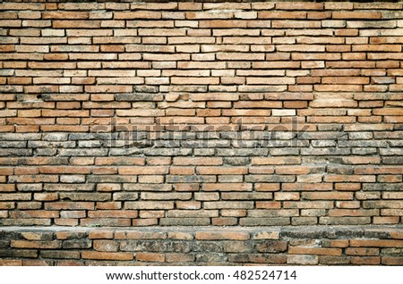 Old brick wall texture grunge background with vignetted corners, may use to interior design.