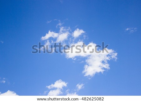 Fluffy white cloud on the blue sky background