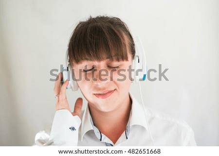 Smiling agent woman with headsets.