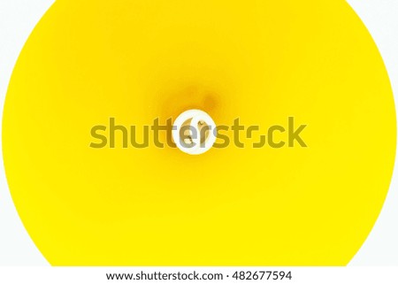 Close up yellow lamp on white background.