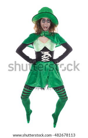 Portrait of an green goblin girl, isolated on white, concept Ireland and fairytales