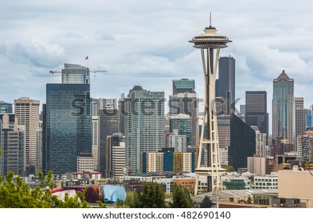 Seattle downtown skyline and cityscape during dark, cloudy and stormy weather Royalty-Free Stock Photo #482690140