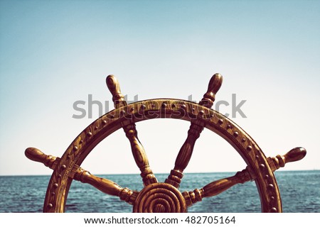 Old Vintage Wooden Helm Wheel Royalty-Free Stock Photo #482705164