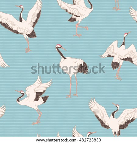 Seamless pattern with ornate dancing japanese cranes. Vector background with traditional asian motives.