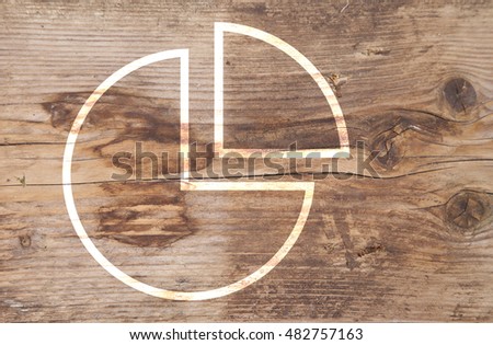 Illustration of pie chart on brown wooden background