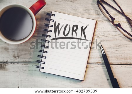 Work  text on notebook with coffee and glasses