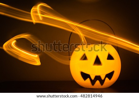 Scary Halloween background with pumpkins on black