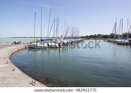 Sailboats and small yachts anchored in Balatonfoldvar at Lake Balaton, Hungary