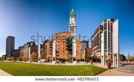 Boston skyline on a beautiful day with custom house tower.