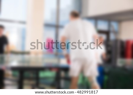 People playing ping pong theme creative abstract blur background with bokeh effect
