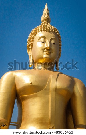 Big Buddha On the bright sky. The temple in Thailand.