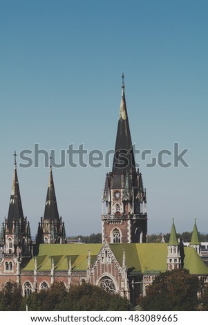 Church of Sts. Olha and Elizabeth with observation deck under the blue sky in Lviv, Ukraine. Gothic style building. Photo with space for text. Picture toned in vintage