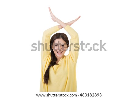 Young asian woman crossed hands. Studio shot on the white background.