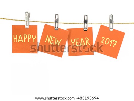 2017 new year. word hanging on the Notes paper cards in clothes pegs on rope with isolate