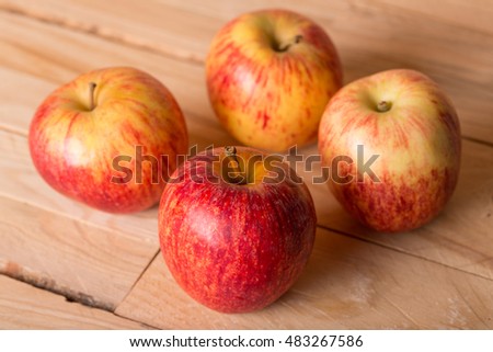 apples on wooden table, studio picture