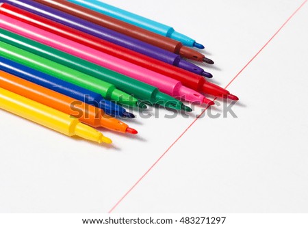 Concept leadership. color pens close-up.