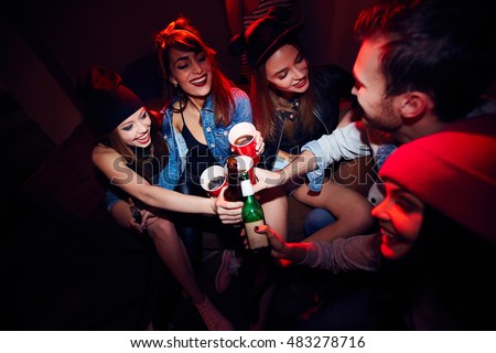 Young Girls Getting Drunk at Party Royalty-Free Stock Photo #483278716