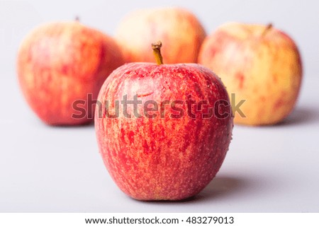apples on a white wooden background, studio picture