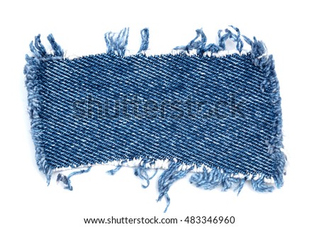 Destroyed torn denim blue jeans frayed flap patch fabric frame on white background Royalty-Free Stock Photo #483346960