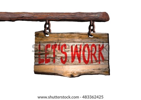 let's work motivational phrase sign on old wood with blurred background