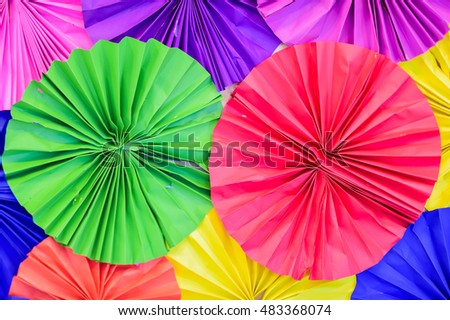 Colorful Circle shape folding paper on white background  ,  Fold the paper into a beautiful circle.
