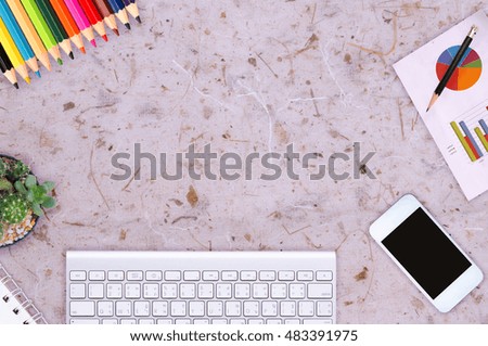 phone, blank note paper, pencil and coffee cup on whetstone desk top view. empty space for text. selective focus.