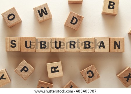 text of SUBURBAN on cubes