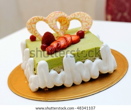 Green tea cake with heart shape sugar icing