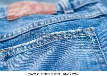 Denim jeans texture or denim jeans with blur leather tag