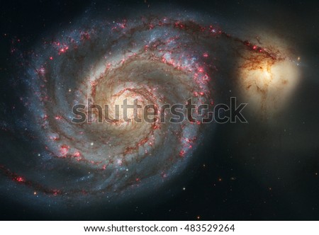 The graceful, winding arms of the majestic spiral galaxy M51 (NGC 5194) appear like a grand spiral staircase sweeping through space,Elements of this image are furnished by NASA.