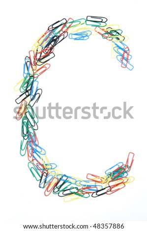 Letter C formed with colorful paperclips