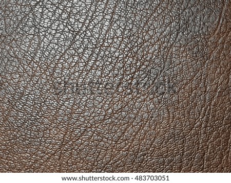 Brown leatherette texture as background