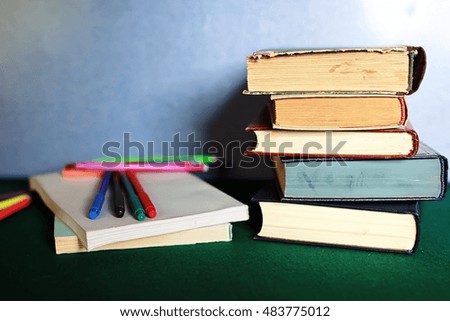 grunge effect photo education book stack apple pen