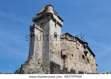 Ancient castle  Liechtenstein, donjon,  Vienna woods,  village  Maria Enzersdorf, Austria - against  bright blue sky