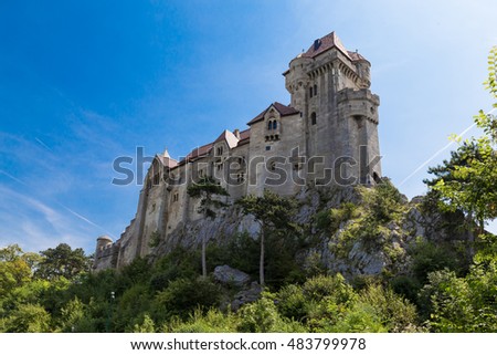 Ancient castle  Liechtenstein,  Vienna woods,  village  Maria Enzersdorf, Austria - against  bright blue sky