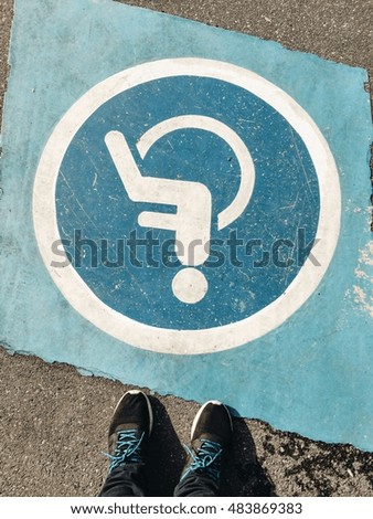 Handicap parking reservation sign on Parking 