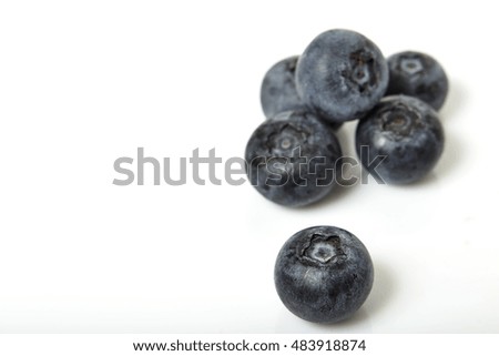 Group of fresh blueberries isolated on white background.